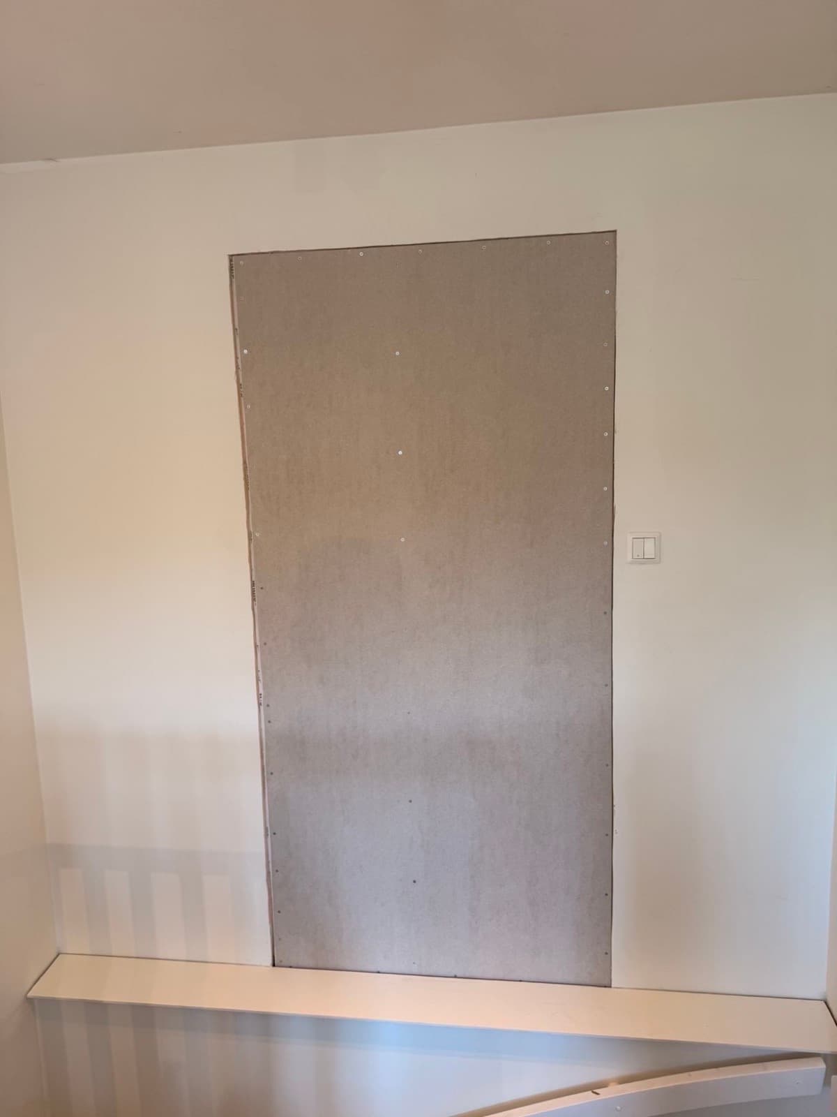 Ny kledning på vegg i Bergen